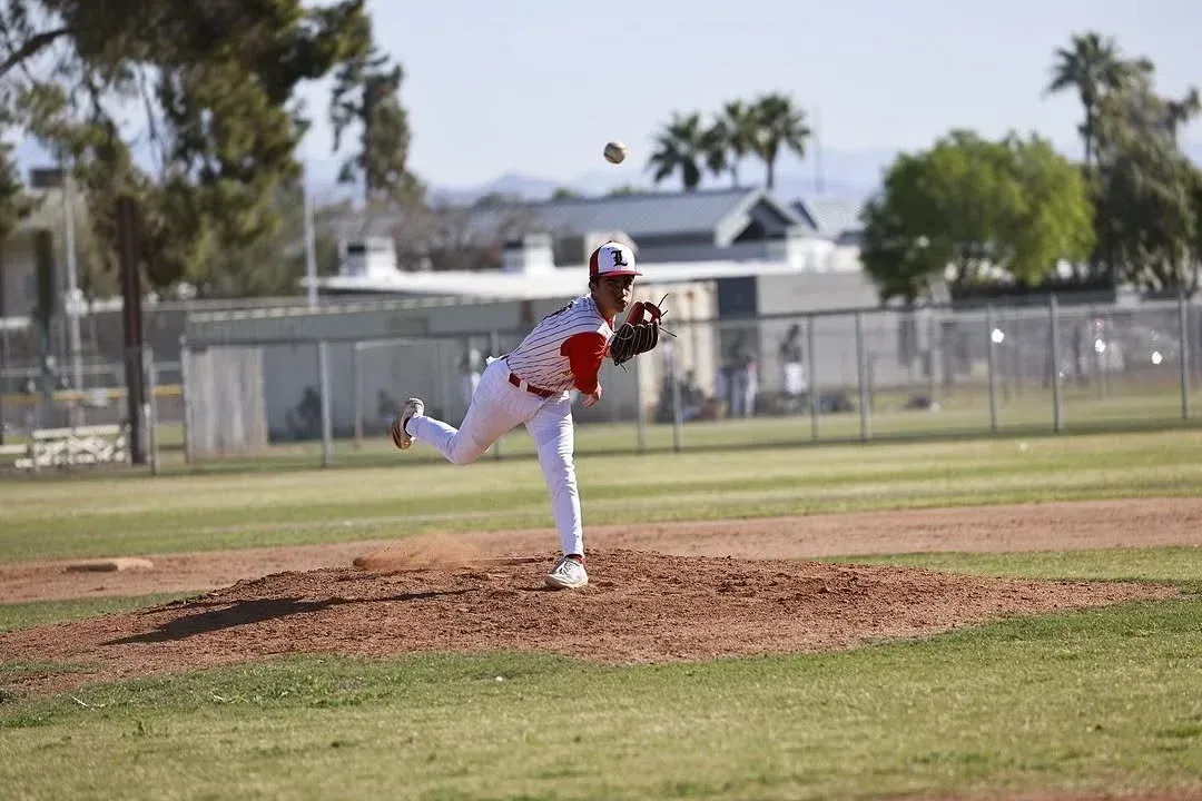 A Legends pitcher mid-delivery