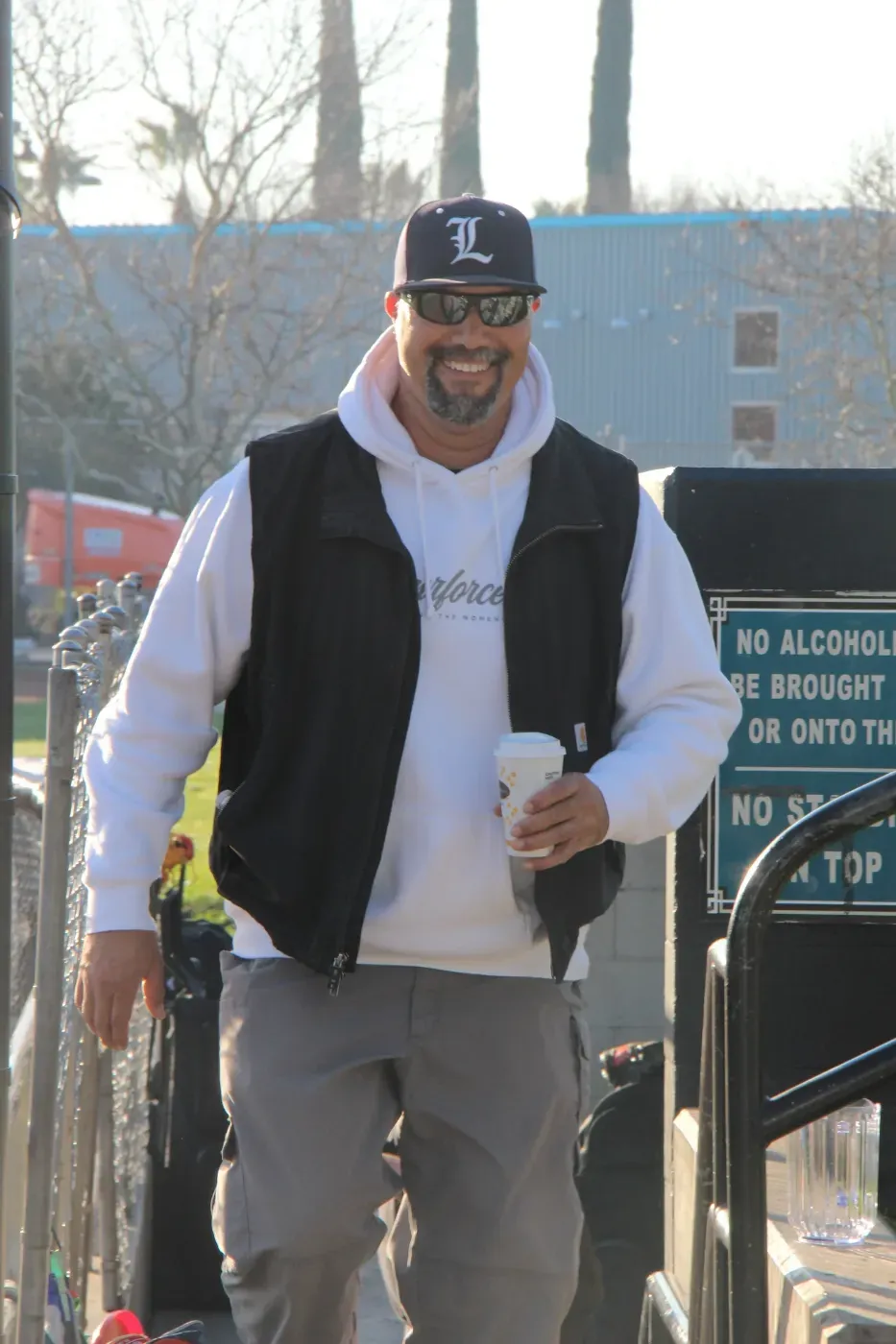 A Legends coach at the field