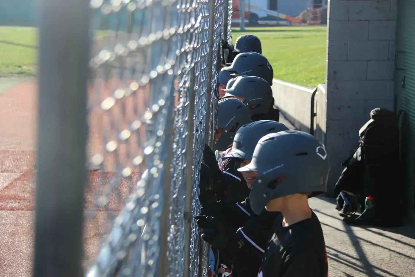Legends players watching from the dugout