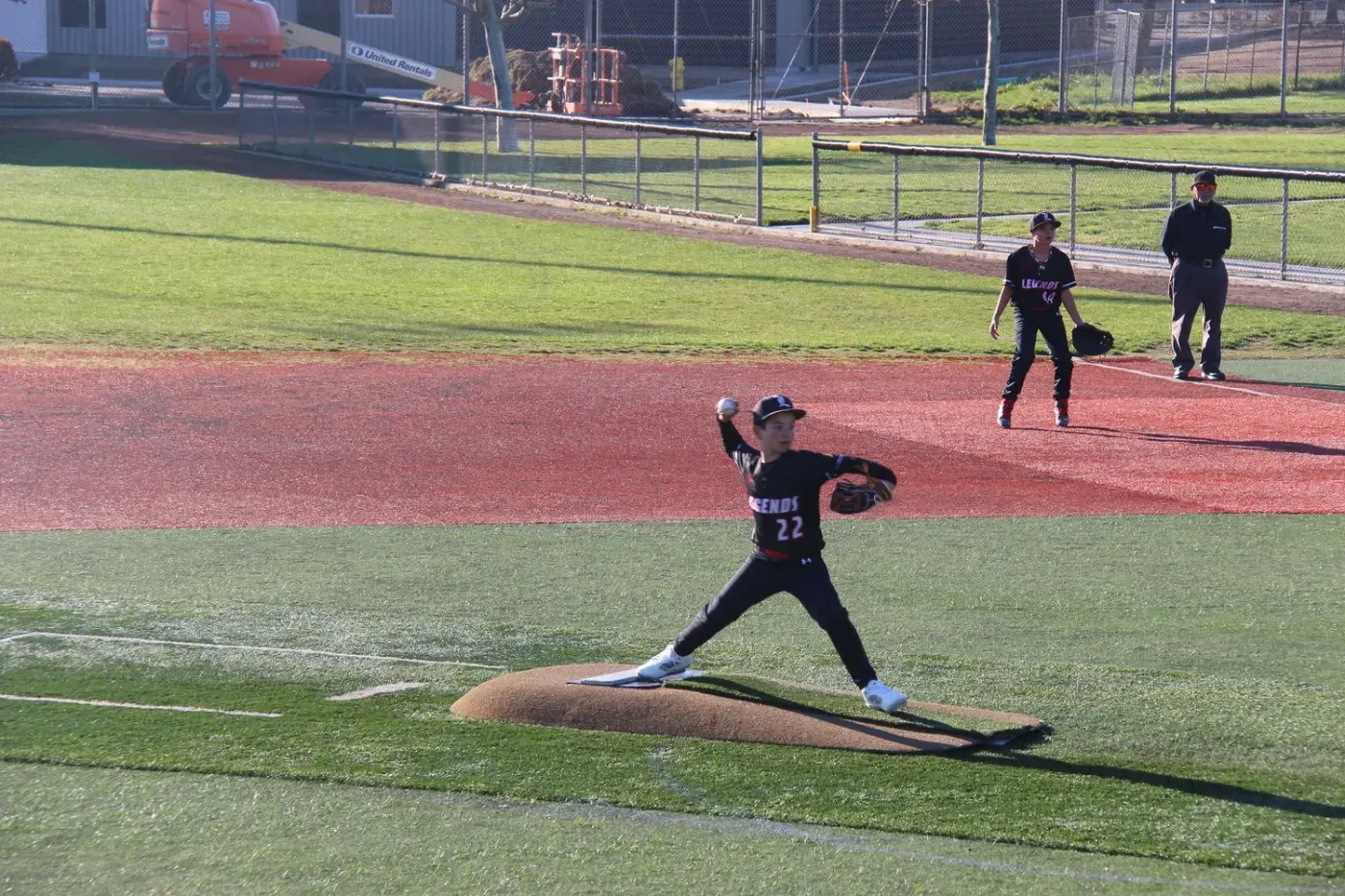 A Legends pitcher delivering from the mound