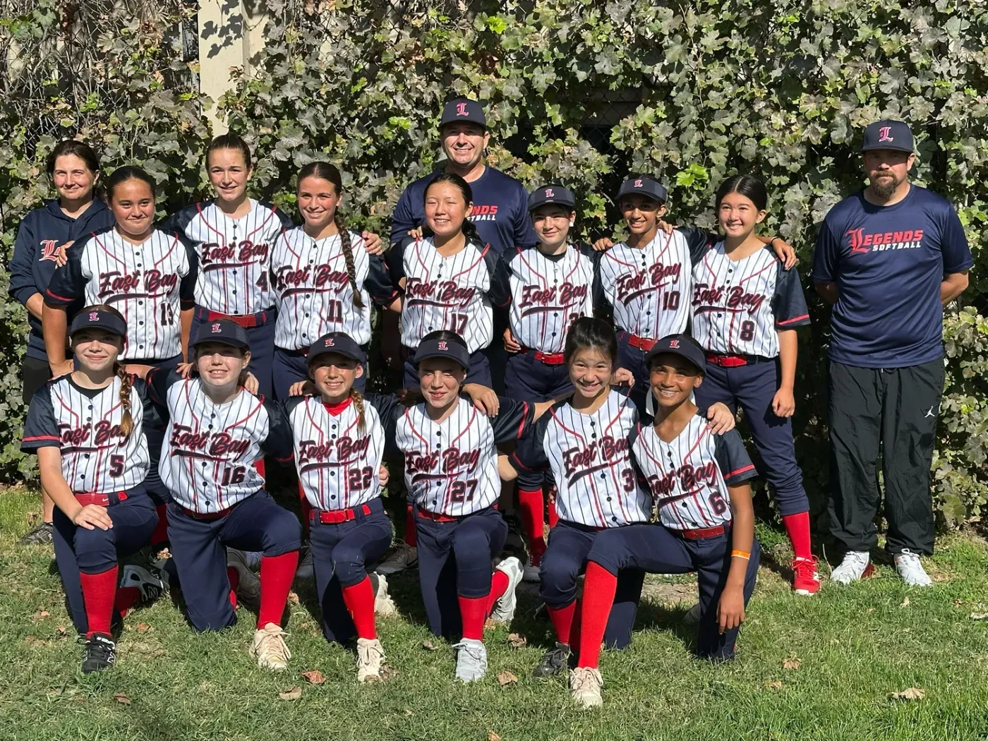 Legends softball team photo with coaches